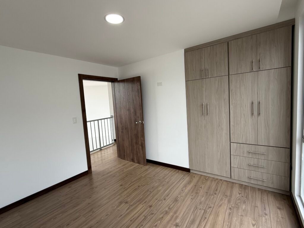 Bedroom with built-in wardrobe