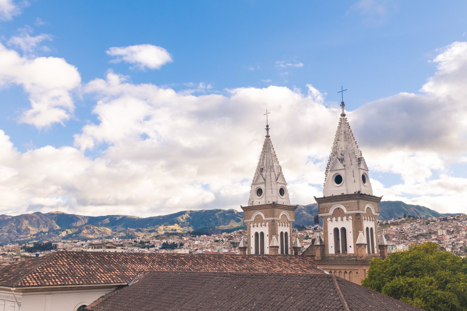 Panoramic view of Loja, Ecuador, with the cathedral towers and surrounding Andean mountains