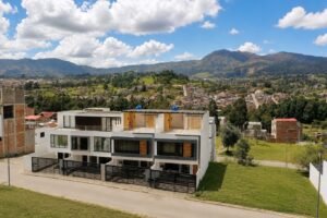 Aerial view of the new Parkenor house and surrounding hills in northeast Loja