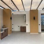 Covered rooftop terrace and barbecue area of the Parkenor house