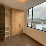 Bedroom with built-in closets and panoramic views in Parkenor, Loja