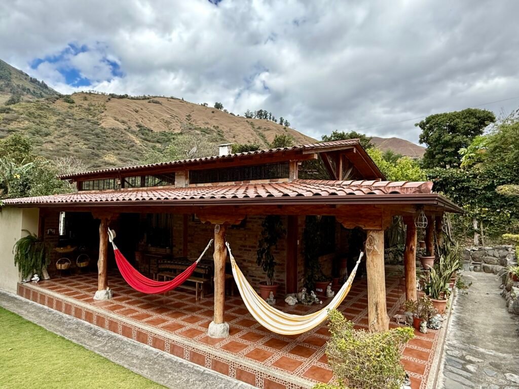 Covered outdoor patio beside the country house