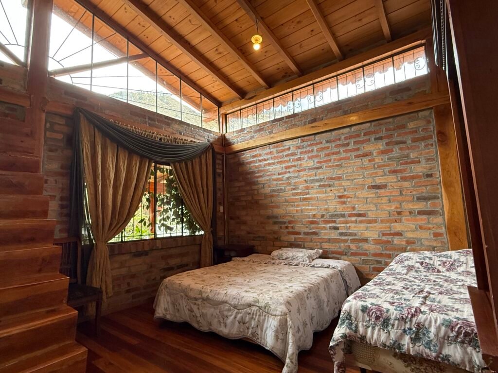 Wooden staircase leading to the upper loft