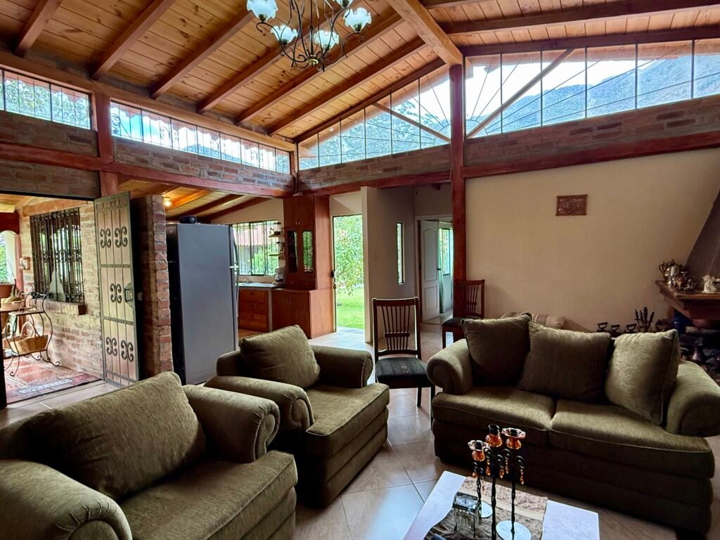 Bright living room with large garden-facing windows