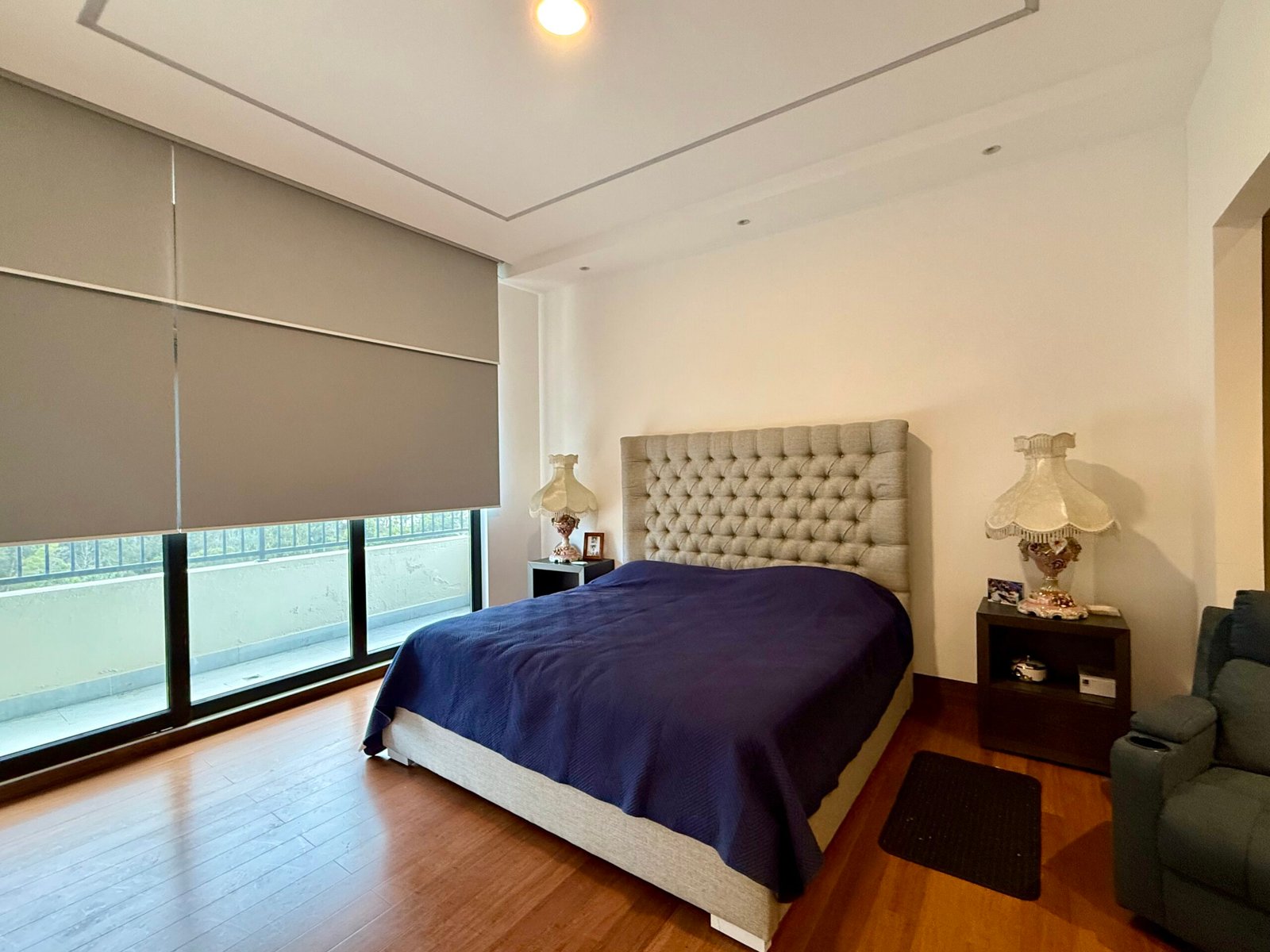 Bright furnished bedroom with modern finishes