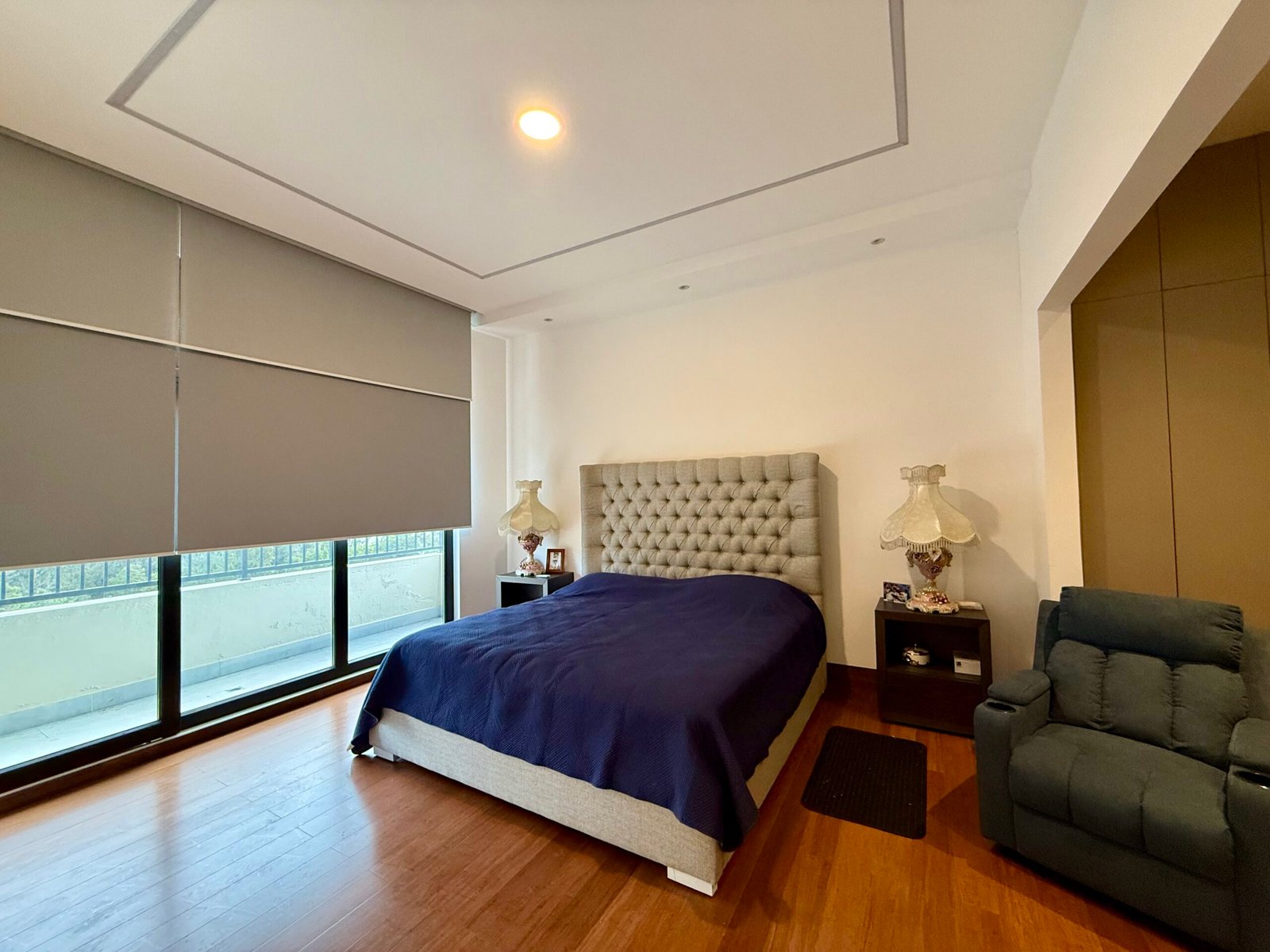 Bedroom interior with natural light and built-in storage