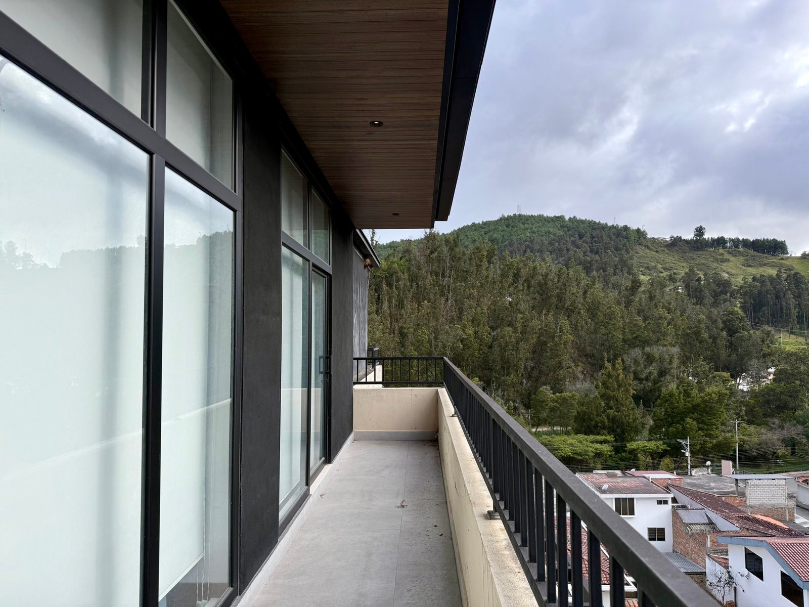 Panoramic balcony overlooking green mountains