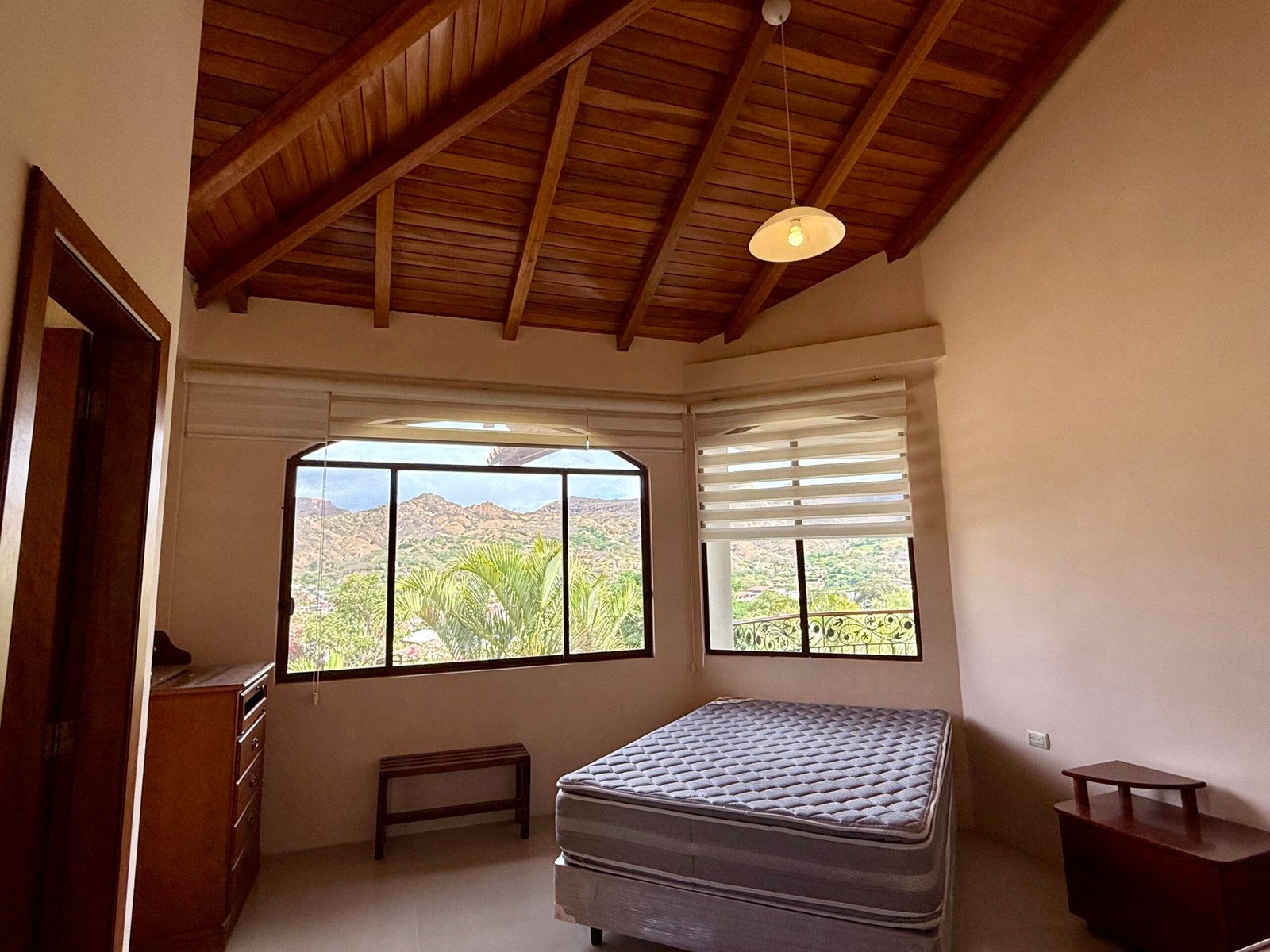 Interior room with exposed wood ceiling beams