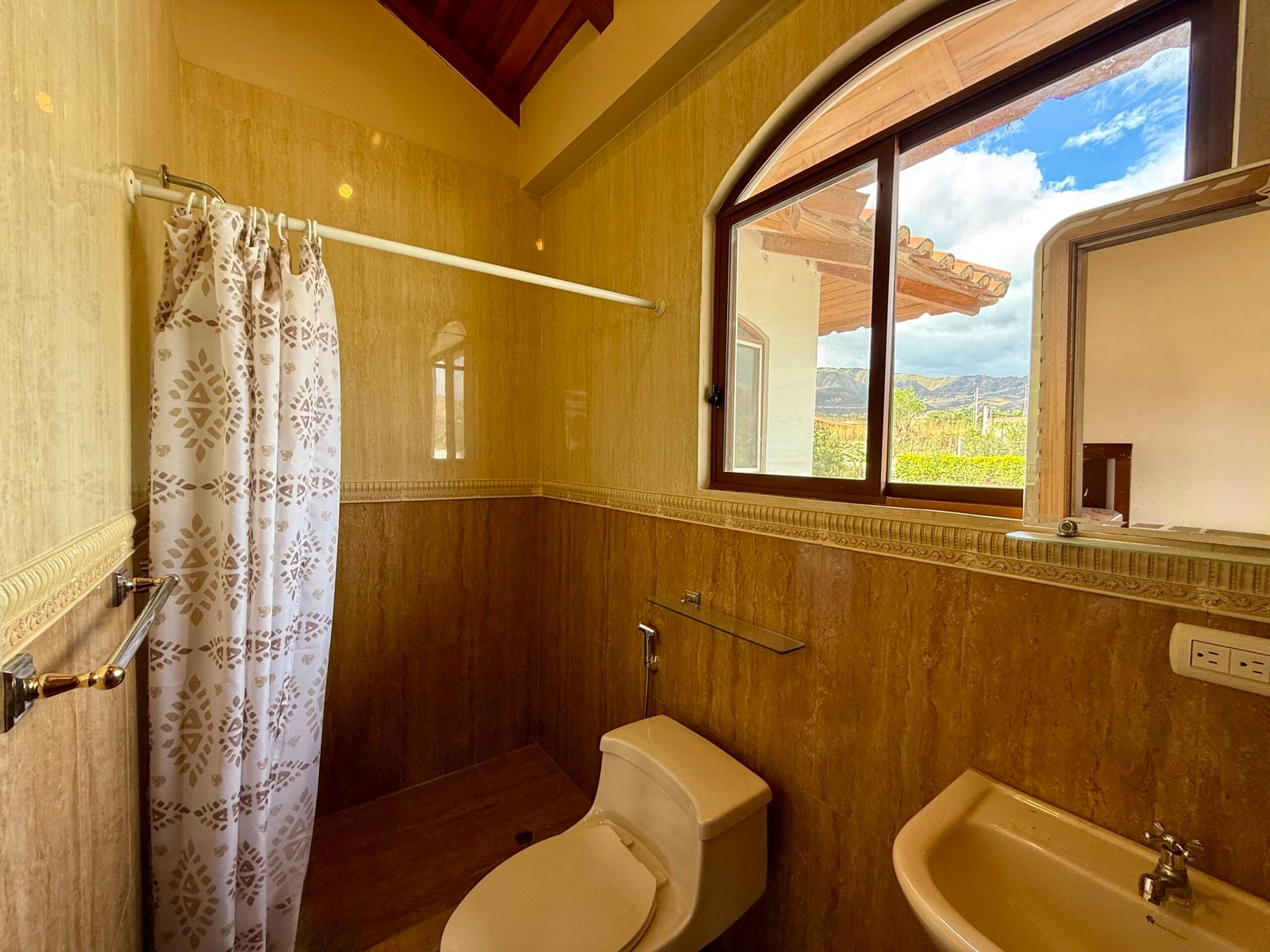 Tiled bathroom with natural light