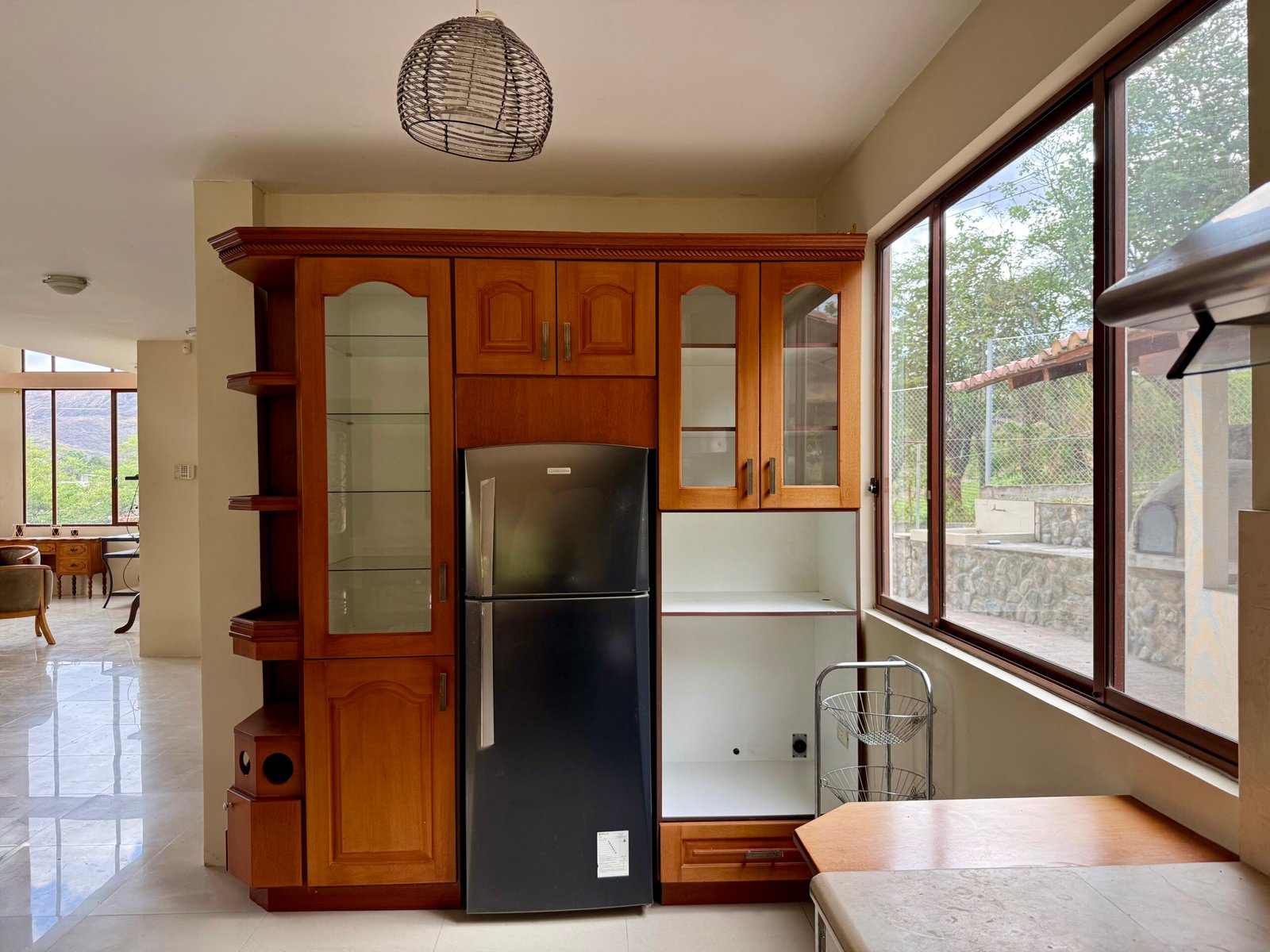 Wood-cabinet kitchen and pantry area