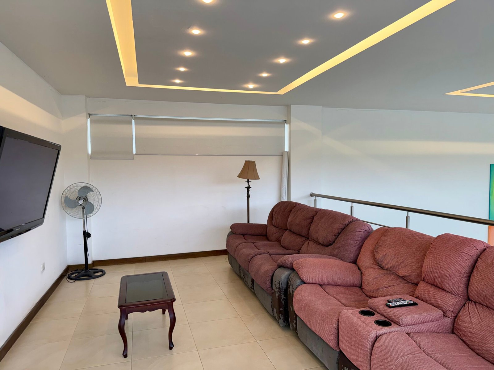 Furnished bedroom with recessed ceiling lighting