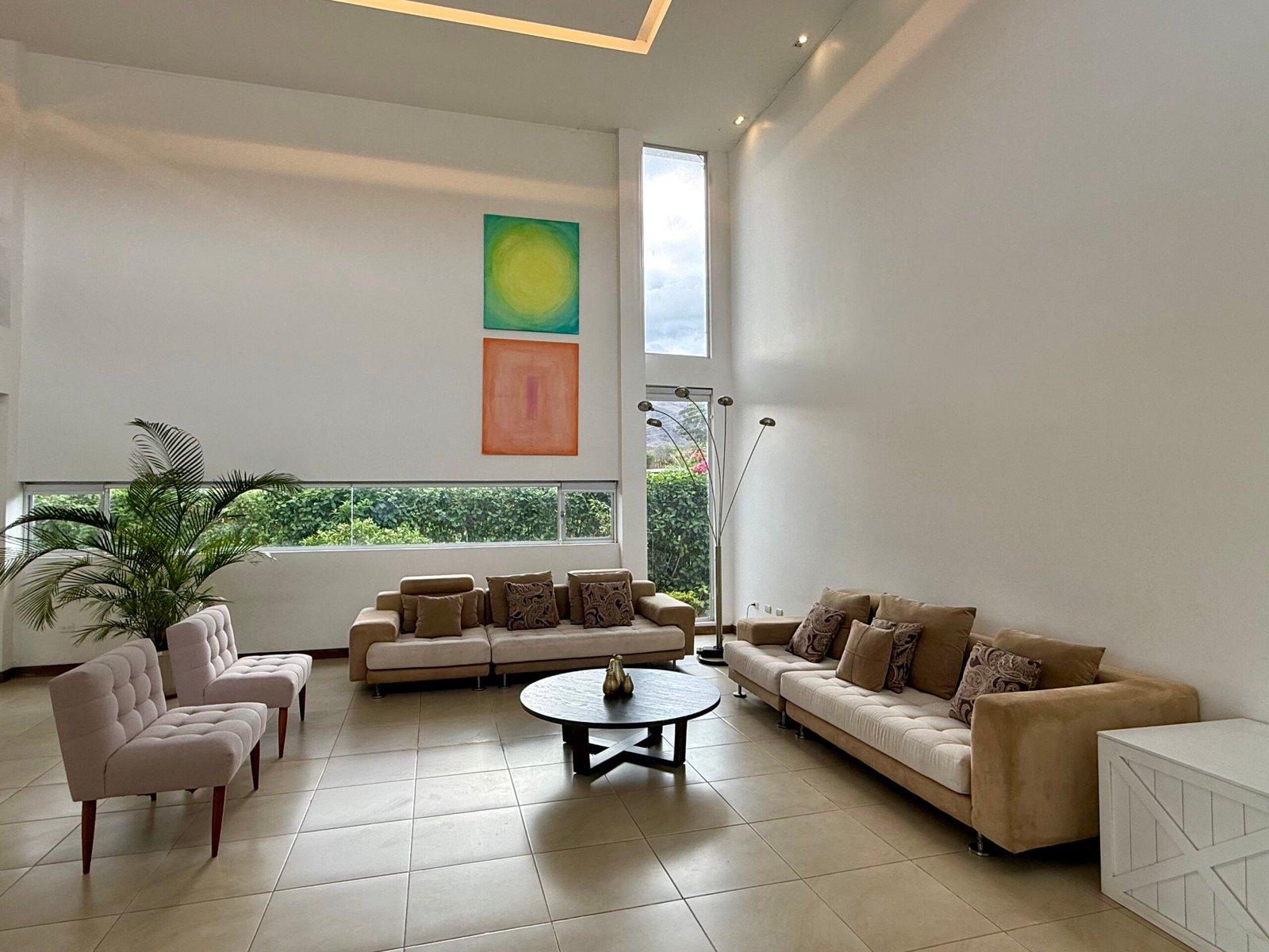 Furnished sitting area with large windows