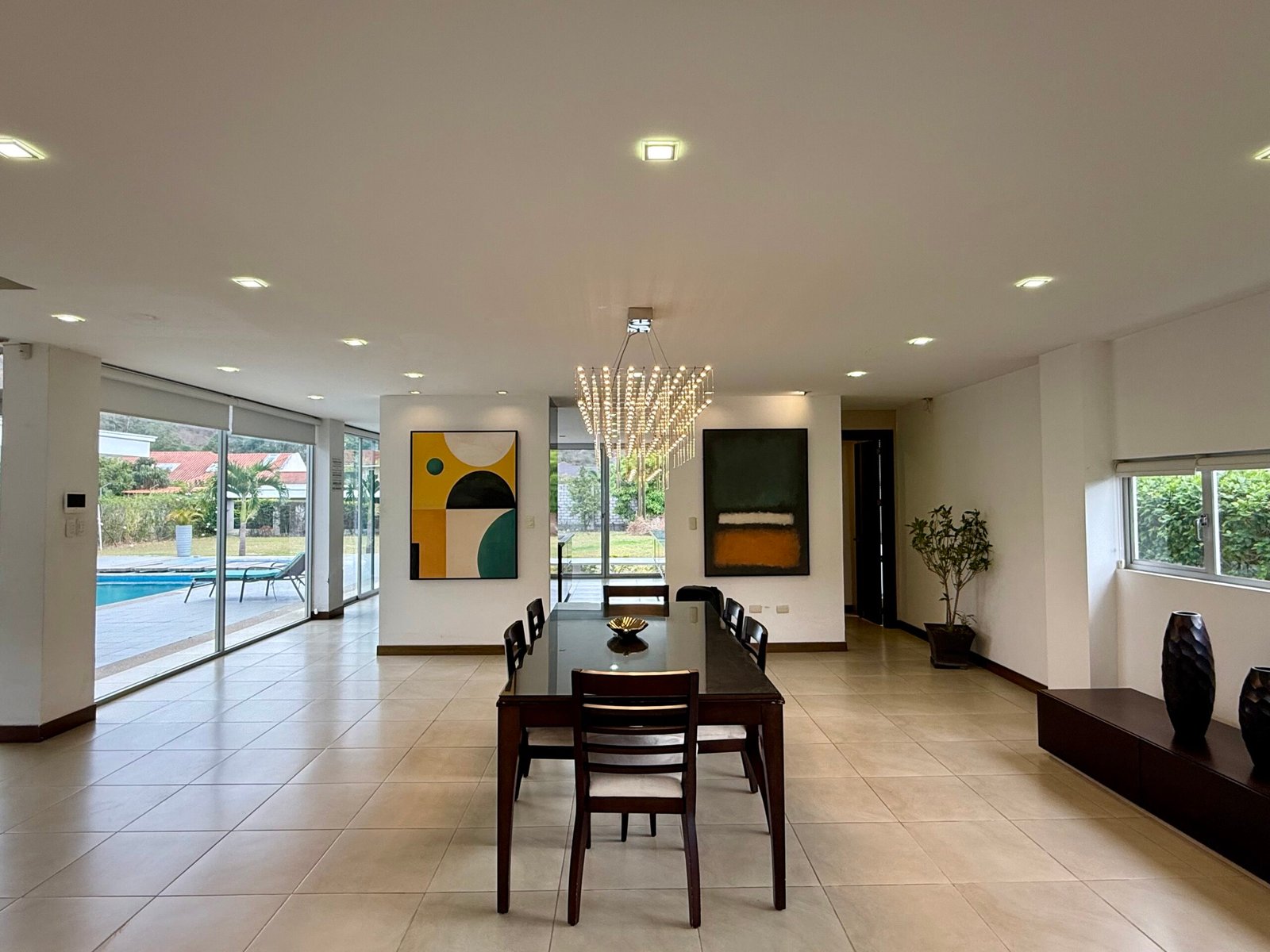Spacious furnished living area with garden access