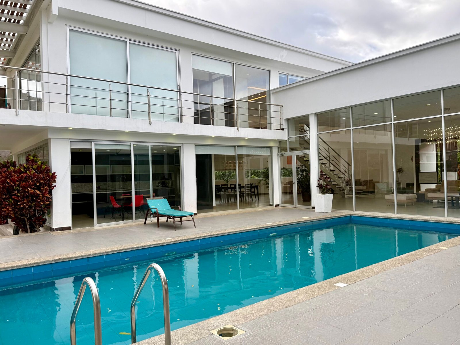 Luxury home exterior with private swimming pool