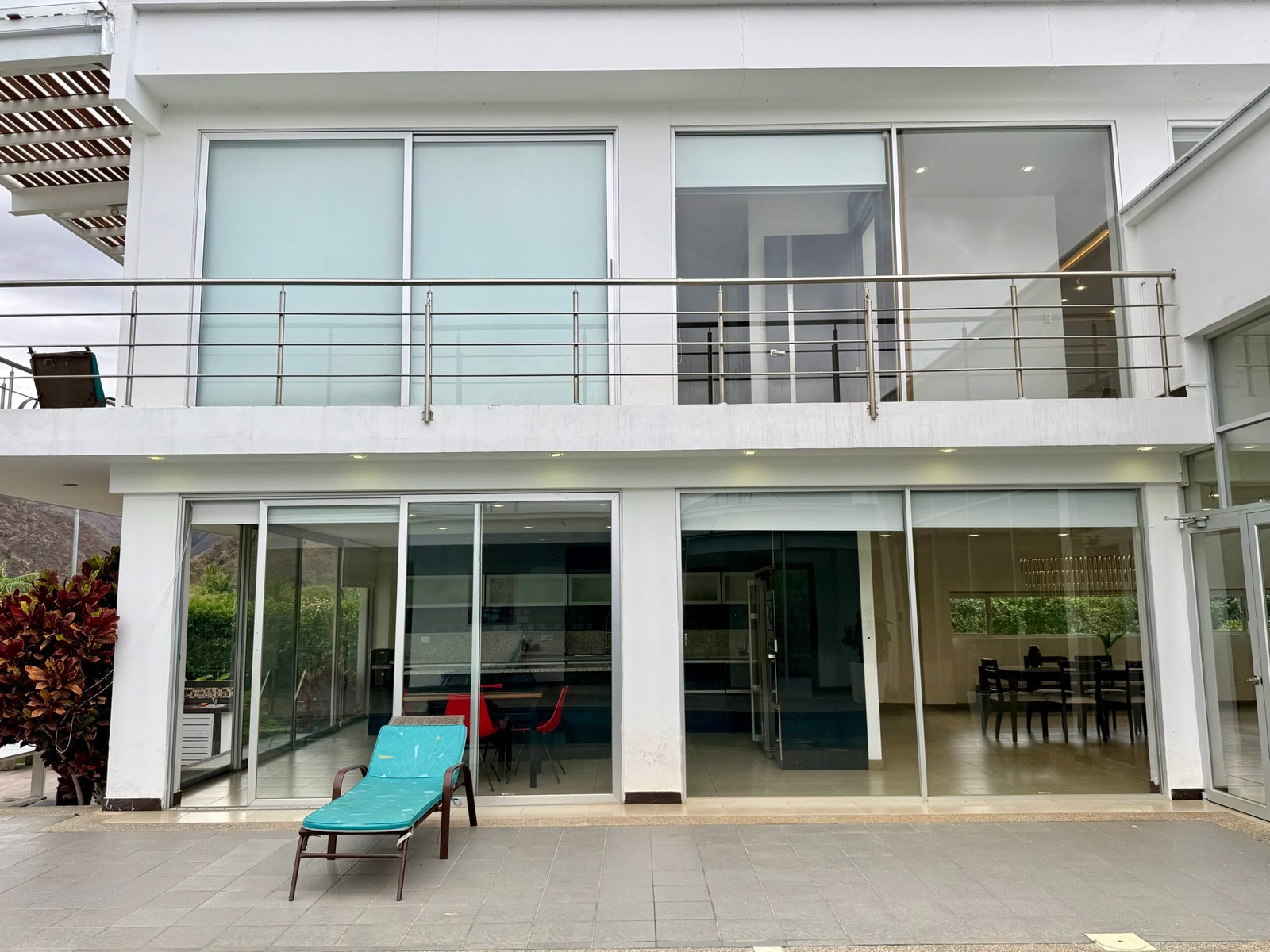 Two-story exterior facing the pool courtyard