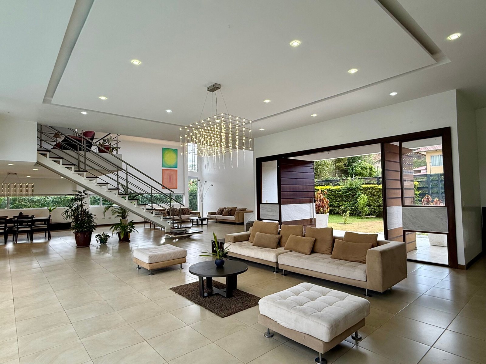 Furnished living room opening to the garden