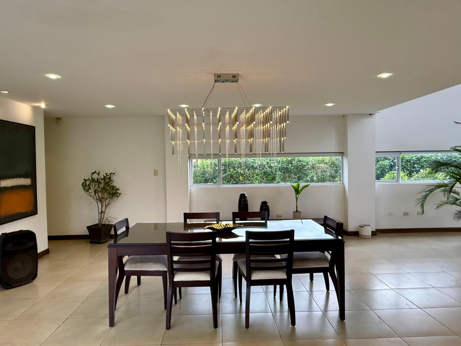 Formal dining room with modern chandelier