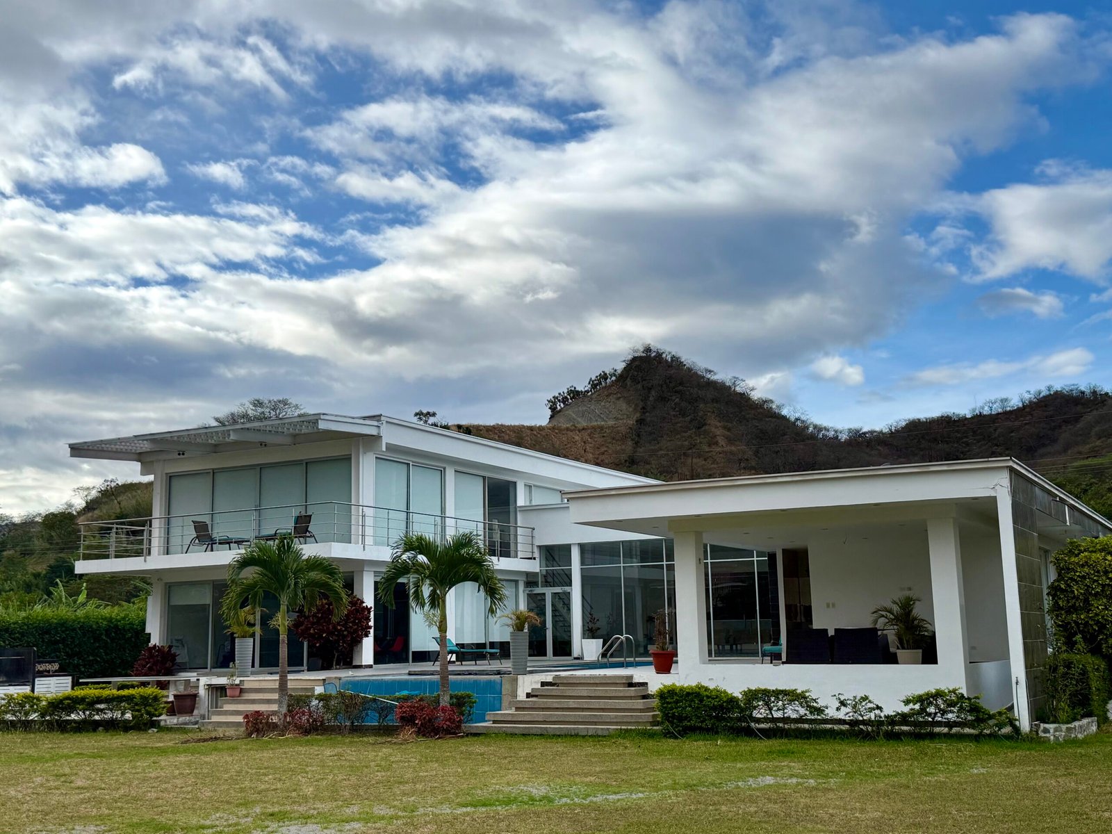 Modern home exterior under a blue sky