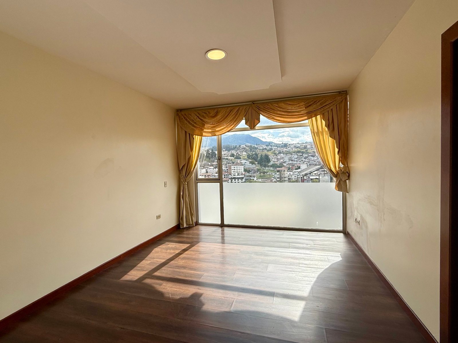 Bright interior space with sliding doors to the balcony