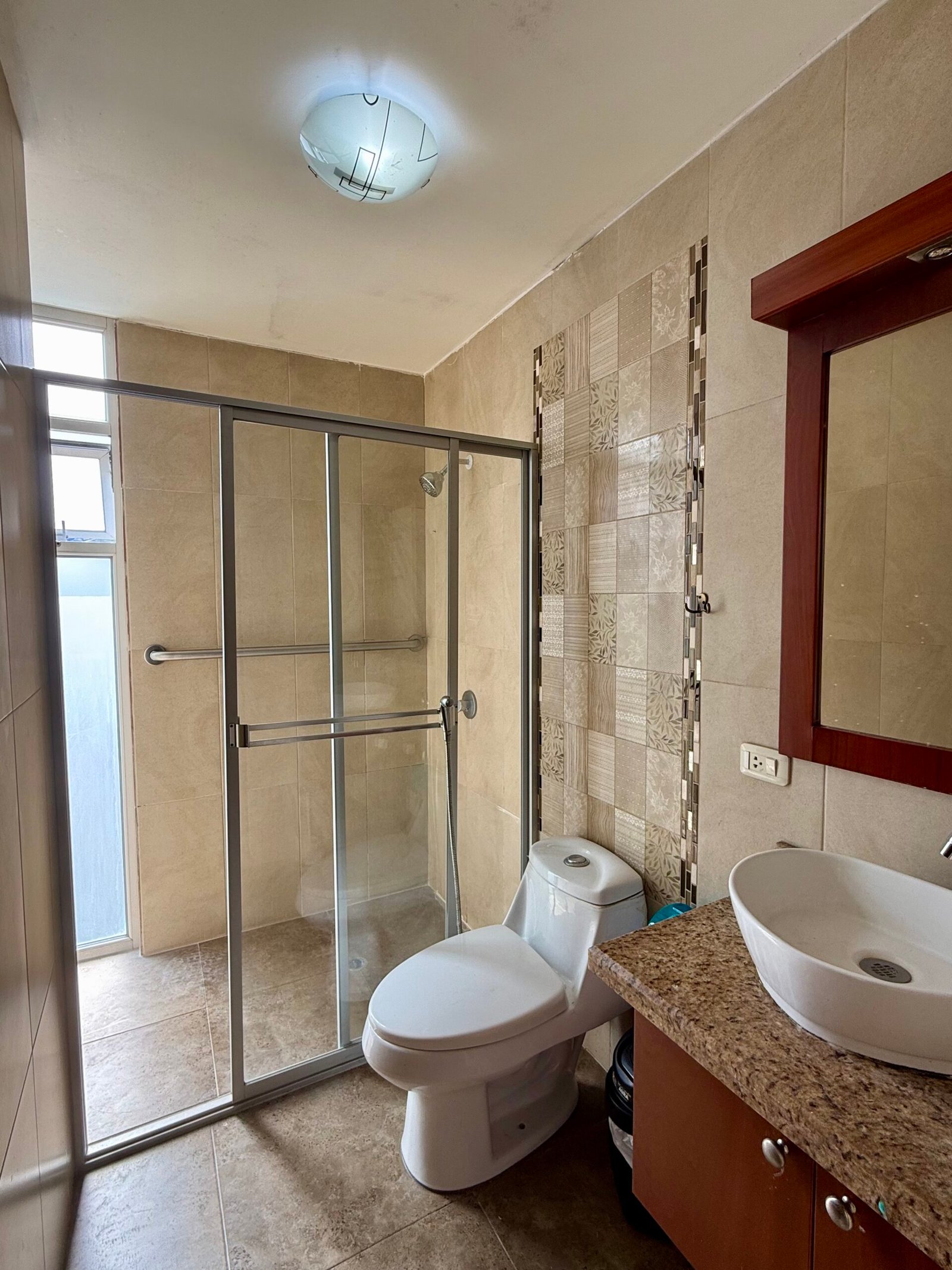 Bathroom with a glass shower enclosure