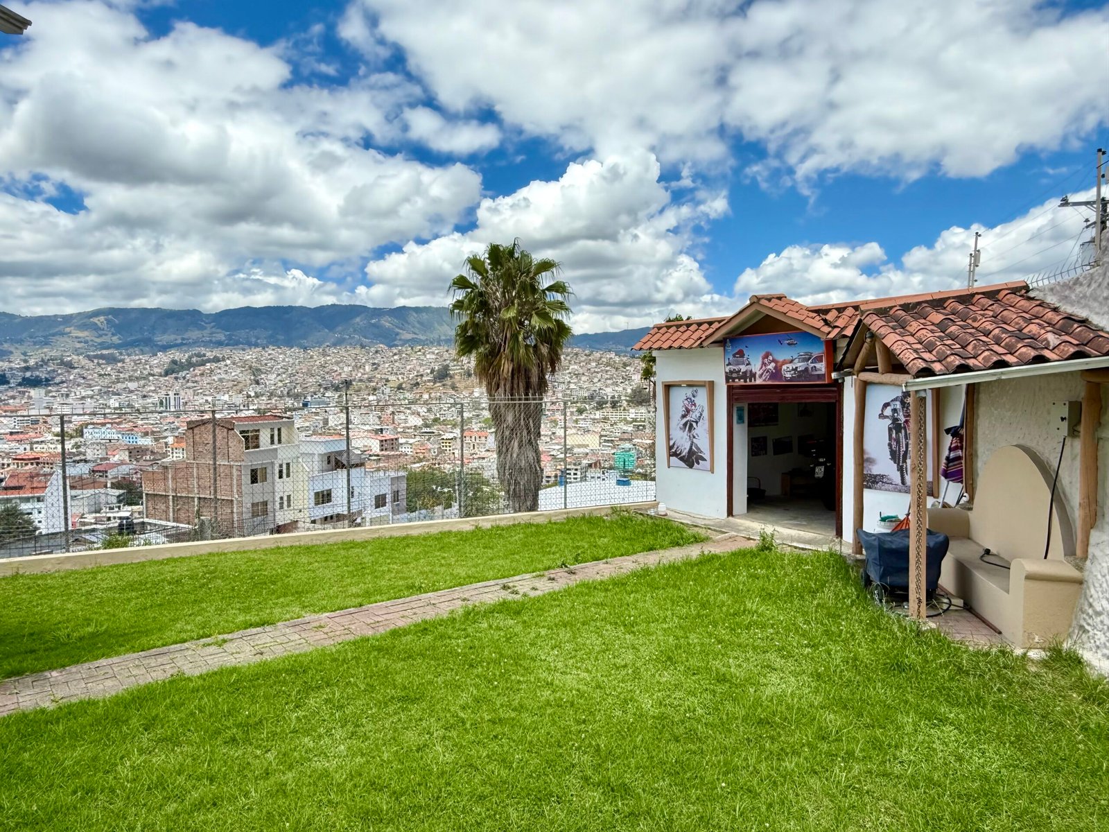 Garden and city panorama at the San Cayetano Alto home