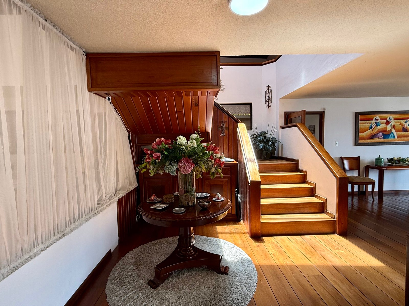 Living room with large windows and city light