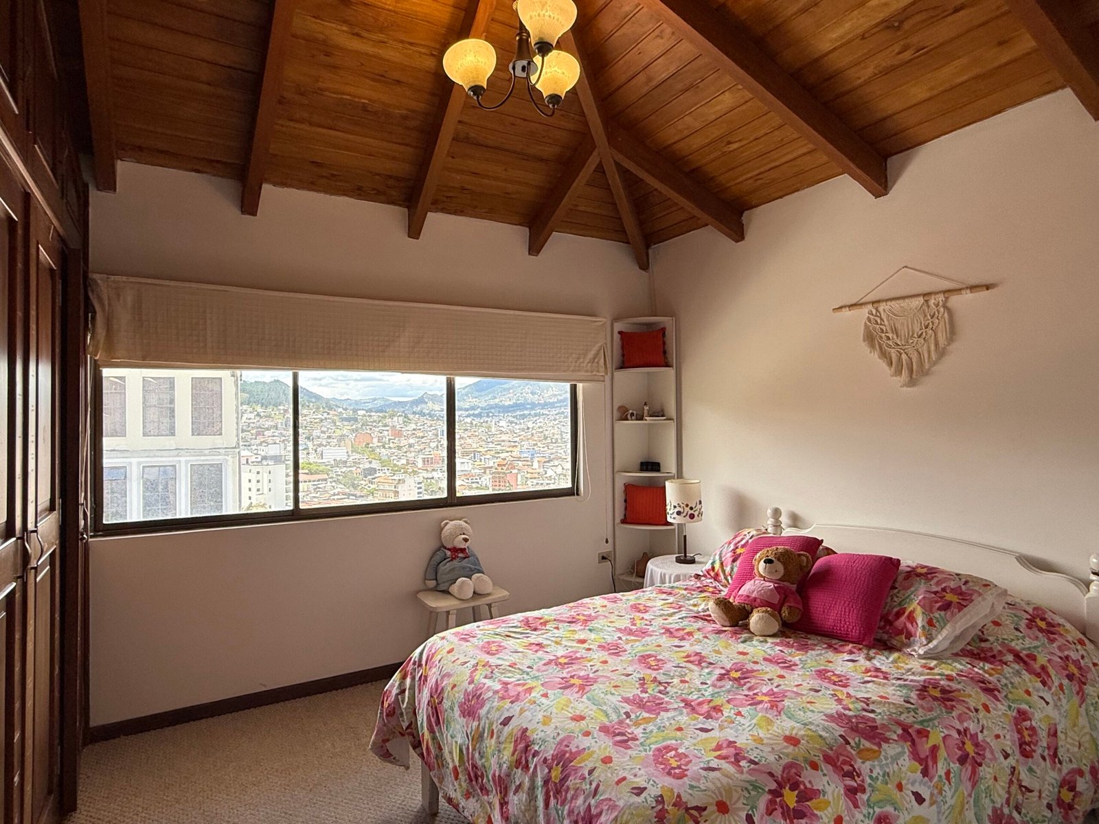 Interior room with exposed wood ceiling beams